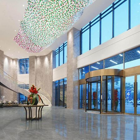Park Inn By Radisson Nanchong Yilong Star City Plaza Esterno foto