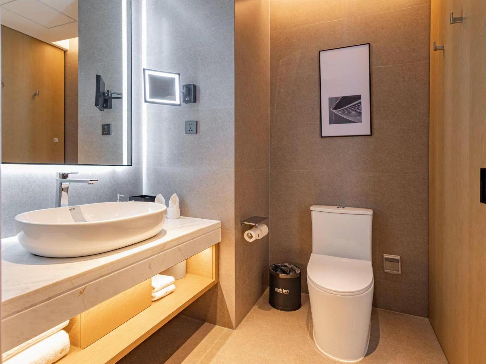 Park Inn By Radisson Nanchong Yilong Star City Plaza Esterno foto