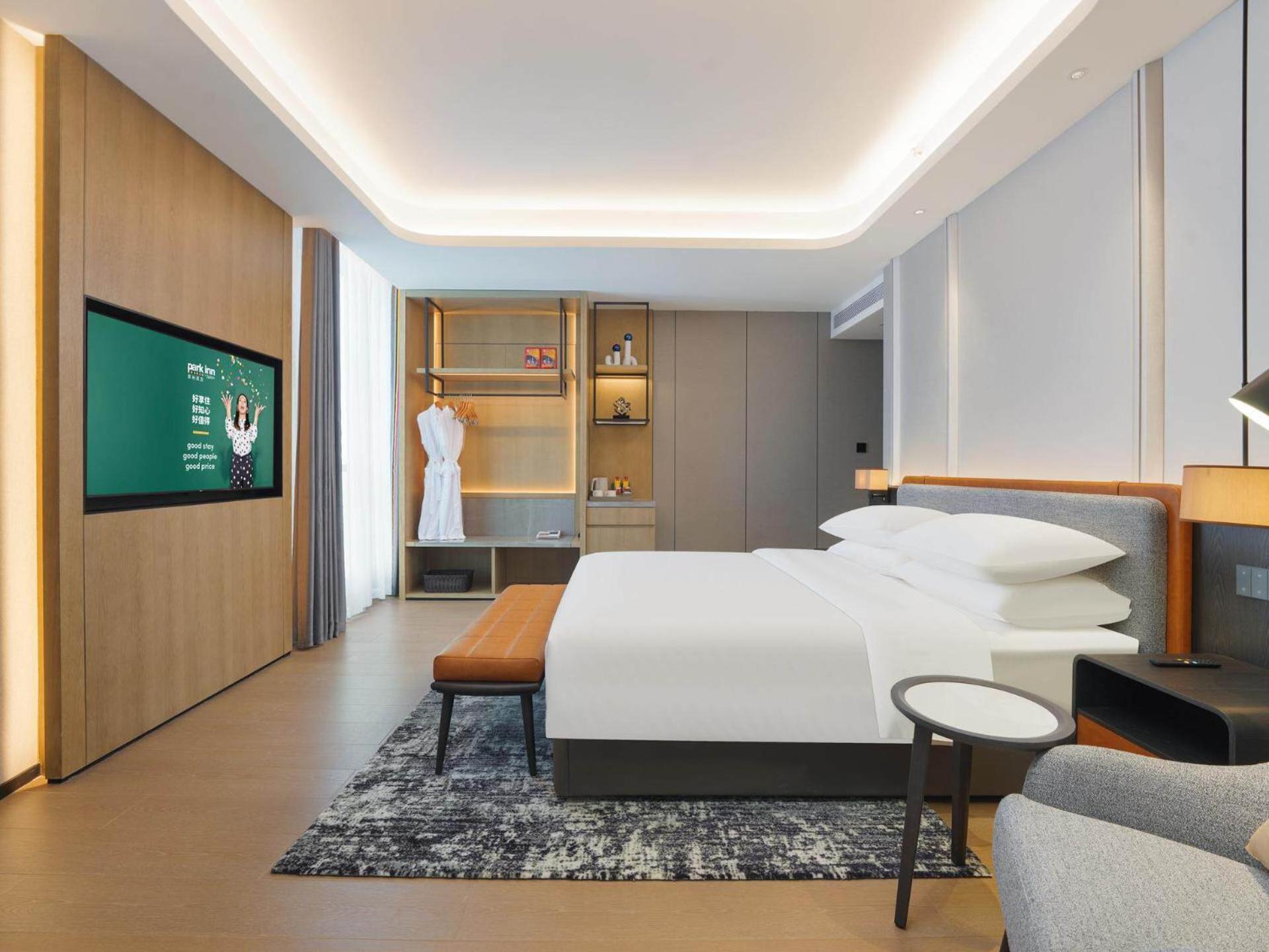 Park Inn By Radisson Nanchong Yilong Star City Plaza Esterno foto