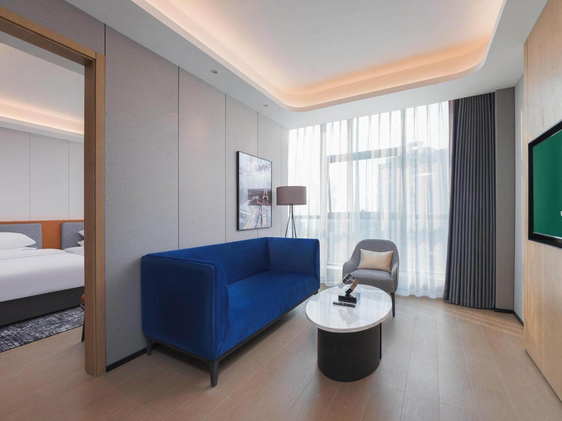 Park Inn By Radisson Nanchong Yilong Star City Plaza Esterno foto
